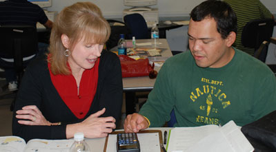 teacher and student analyzing data