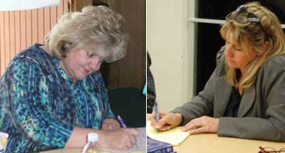 two women writing